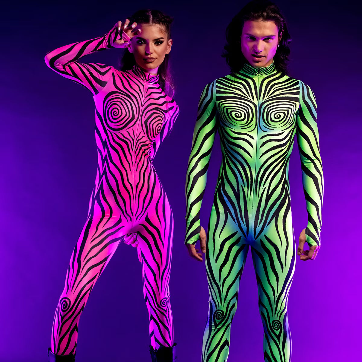 Woman and man wearing matching pink and green neon zebra-print bodysuits as Halloween couple costume inspiration for Coloween Denver.