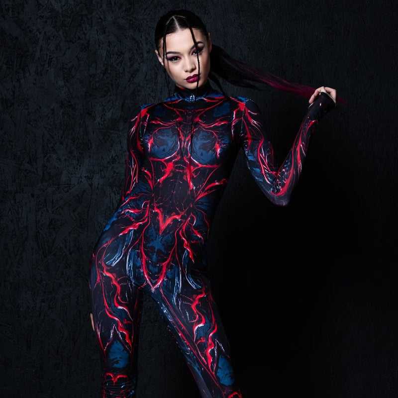 Woman wearing a black bodysuit with red supernatural patterns and chunky platform boots for a Halloween rave look at Tight Crew Providence.