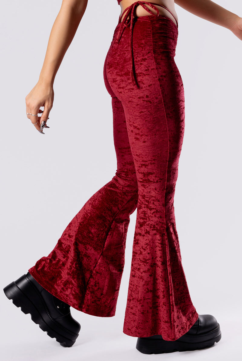 crimson-kiss-hip-strap-flare-pants-red-velvet-close-side-view